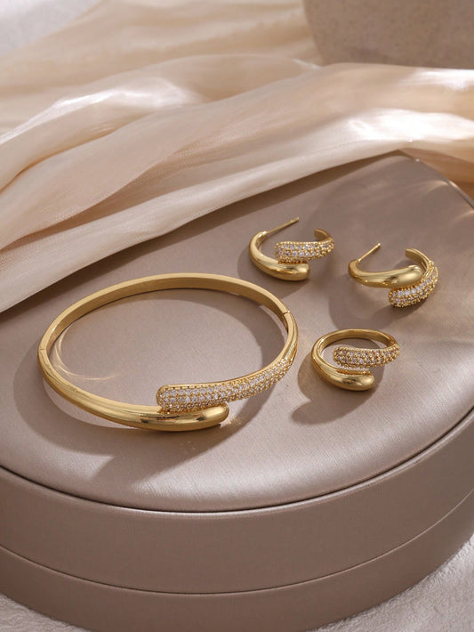 4 Piece Gold Tone Crystal Accent Jewelry Set – Bangle Bracelet Hoop Earrings and Ring – Elegant Women Accessories
