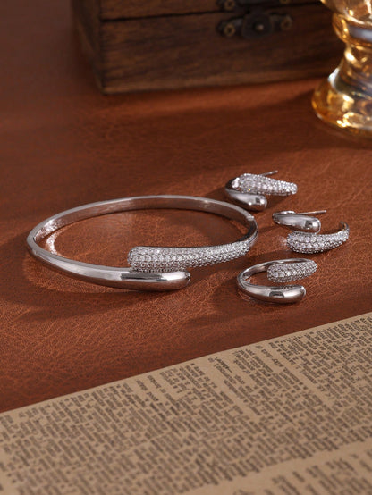 4 Piece Gold Tone Crystal Accent Jewelry Set – Bangle Bracelet Hoop Earrings and Ring – Elegant Women Accessories