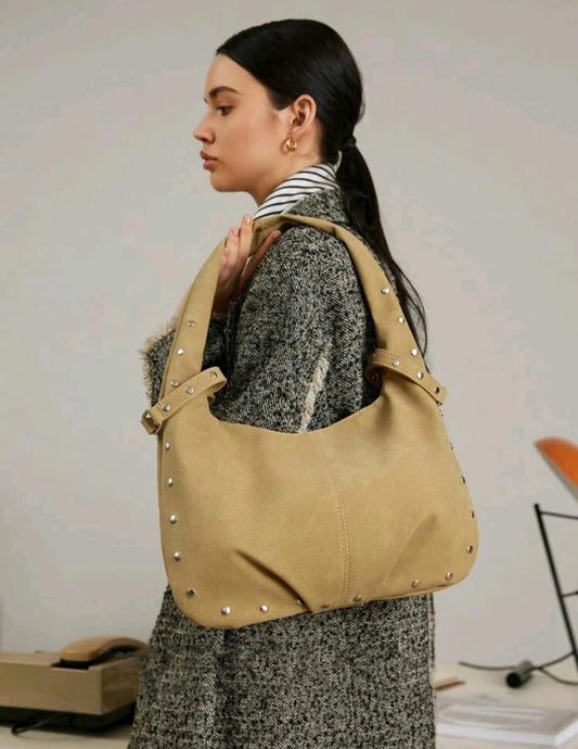 Beige Suede Shoulder Bag â€“ Classic Curved Style with Silver Studs